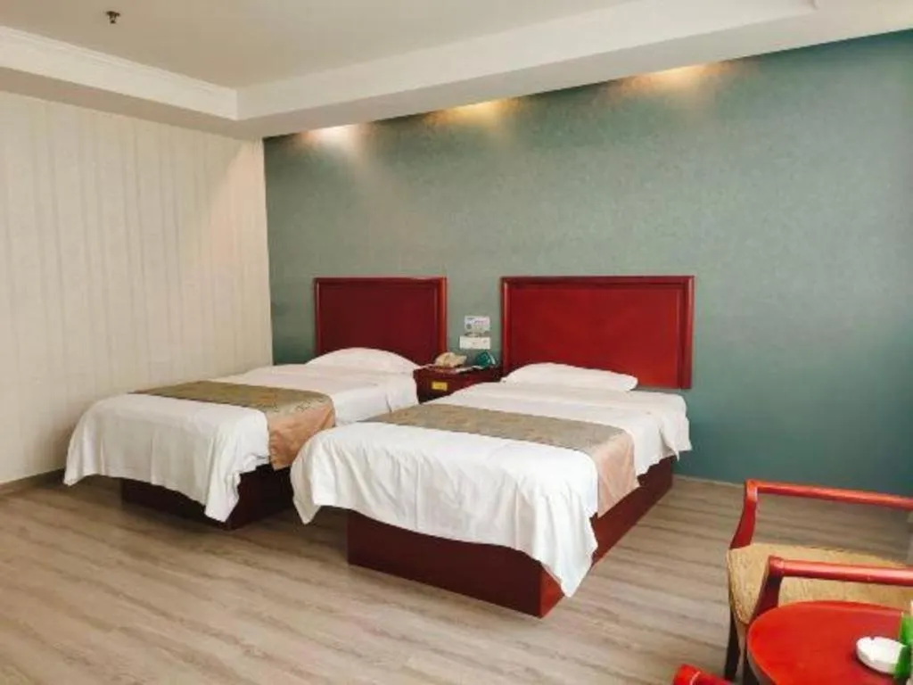 Bed in GreenTree Inn Suzhou Shengze Hotel