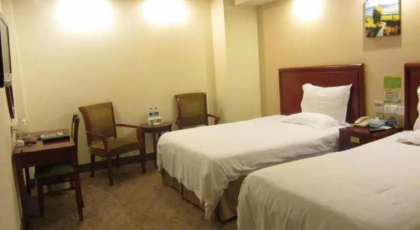 Bed in GreenTree Inn Suzhou Shengze Hotel