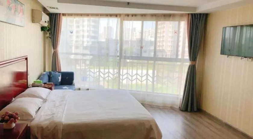 Bed in GreenTree Inn Suzhou Shengze Hotel