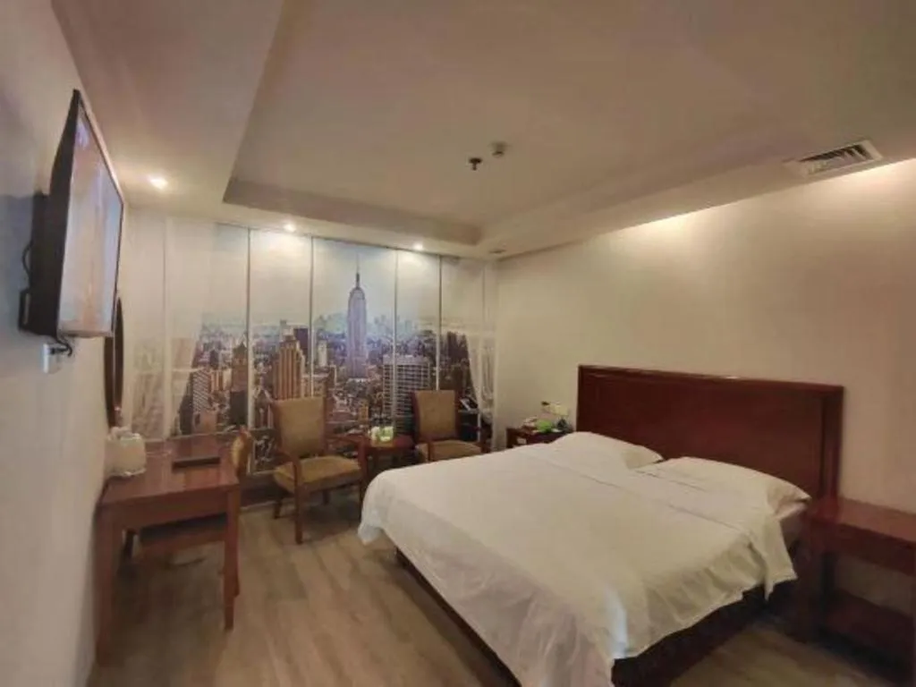 Bed in GreenTree Inn Suzhou Shengze Hotel