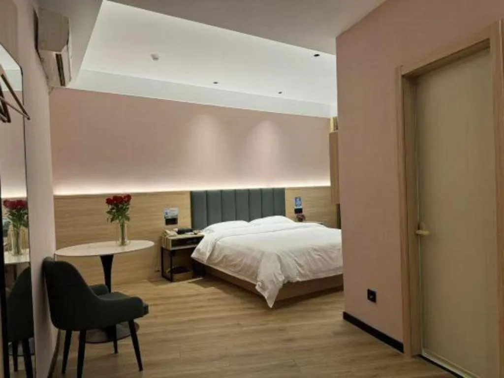 Bed in GreenTree Inn Suzhou Shengze Hotel