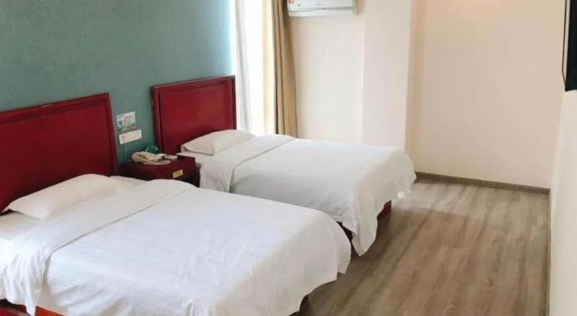 Bed in GreenTree Inn Suzhou Shengze Hotel