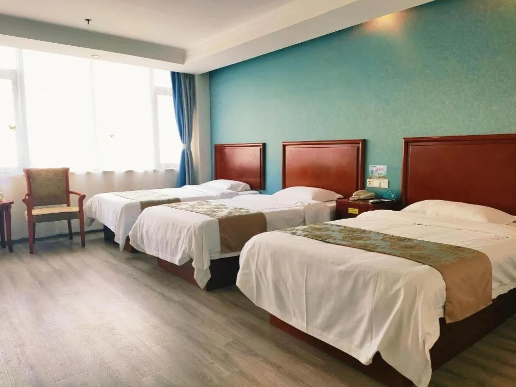 Bed in GreenTree Inn Suzhou Shengze Hotel