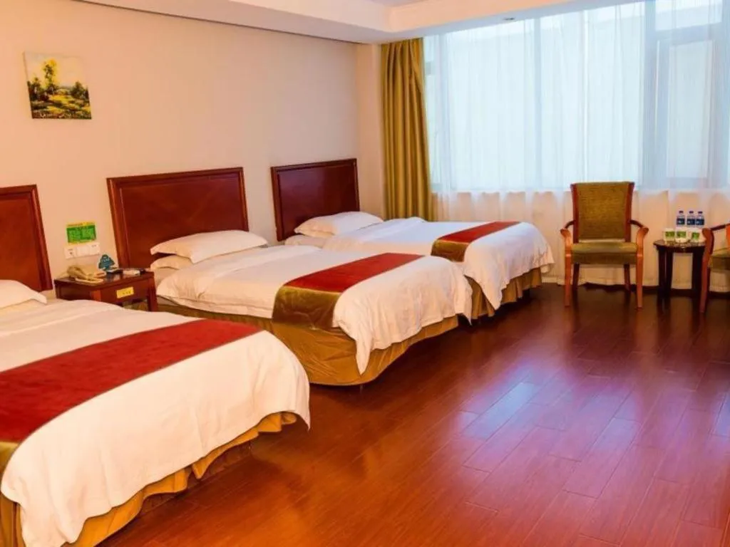 Bed in GreenTree Inn Suzhou Shengze Hotel