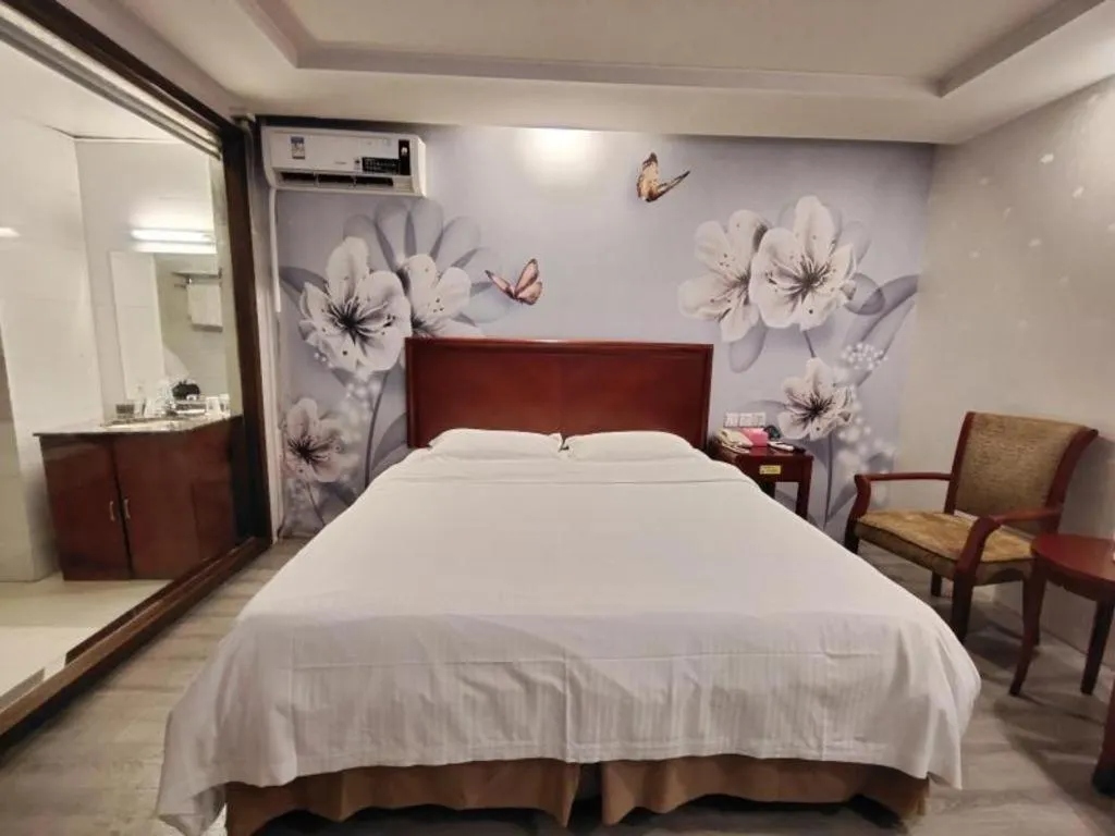 Bed in GreenTree Inn Suzhou Shengze Hotel