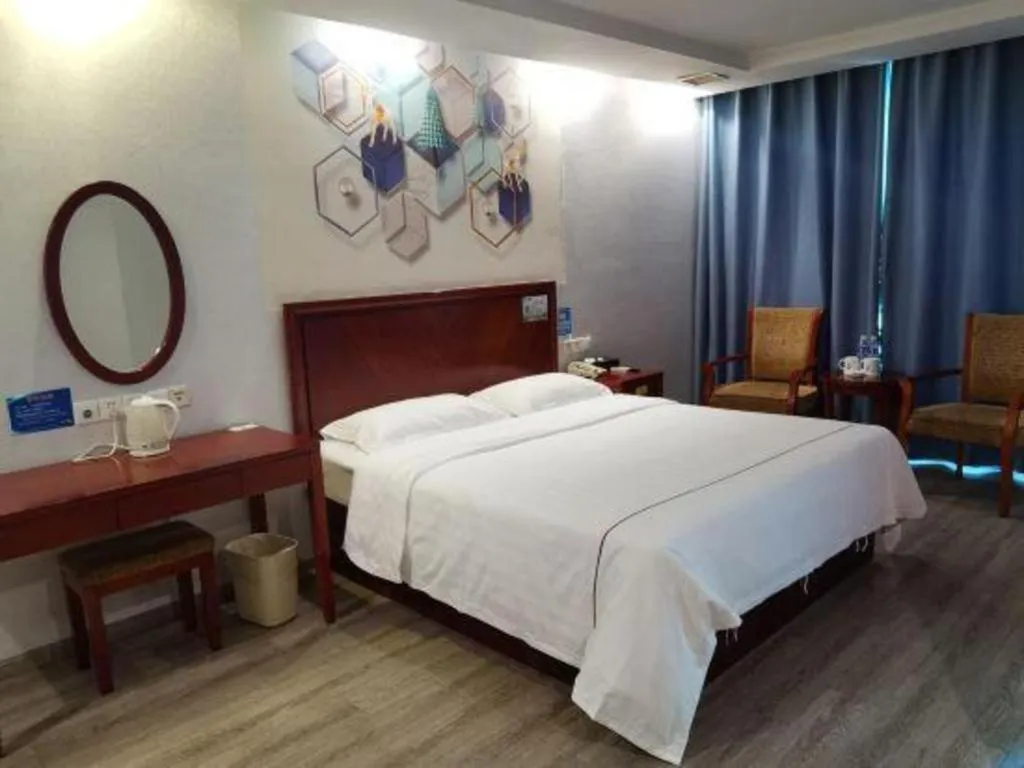 Bed in GreenTree Inn Suzhou Shengze Hotel