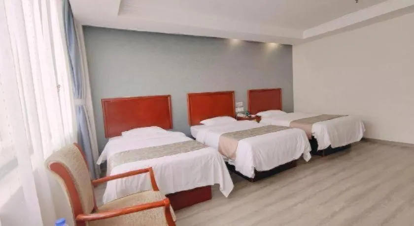 Bed in GreenTree Inn Suzhou Shengze Hotel