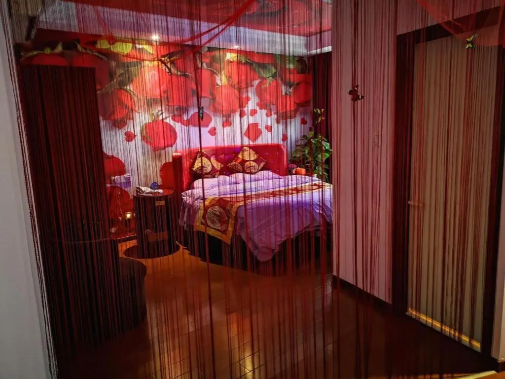 Bed in GreenTree Inn Suzhou Shengze Hotel