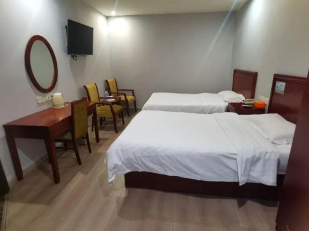 Bed in GreenTree Inn Suzhou Shengze Hotel