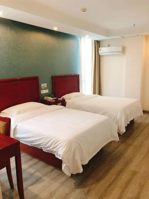 Bed in GreenTree Inn Suzhou Shengze Hotel