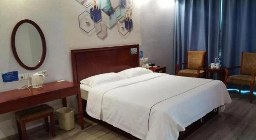 Bed in GreenTree Inn Suzhou Shengze Hotel