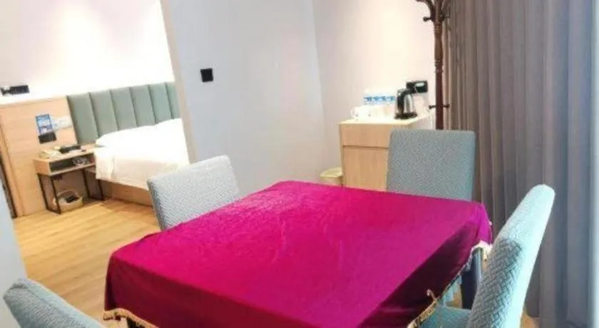 Bed in GreenTree Inn Suzhou Shengze Hotel