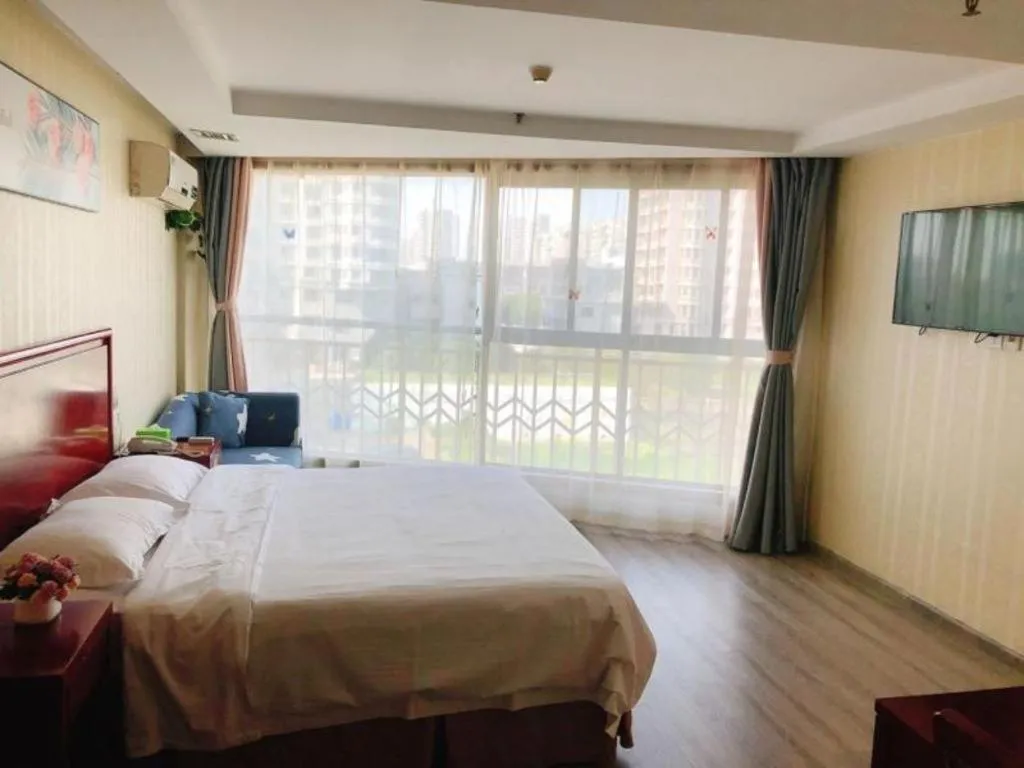 Bed in GreenTree Inn Suzhou Shengze Hotel