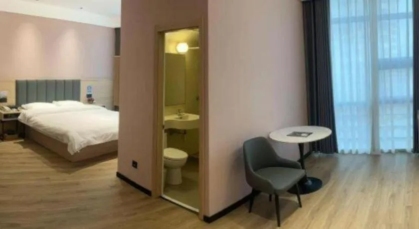 Bed in GreenTree Inn Suzhou Shengze Hotel