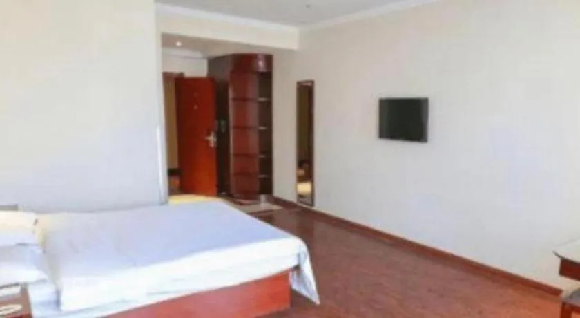 Bed in GreenTree Inn Suzhou Shengze Hotel