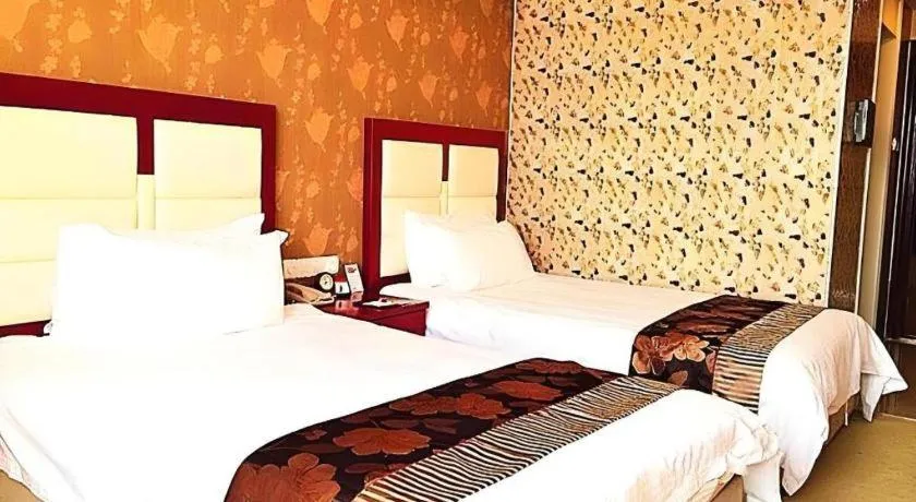 Bed in Ningbo ShouNan Hotel