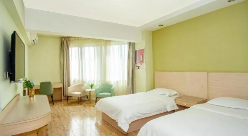 Bed in Super 8 Hotel Chengde Imperial Summer Resort