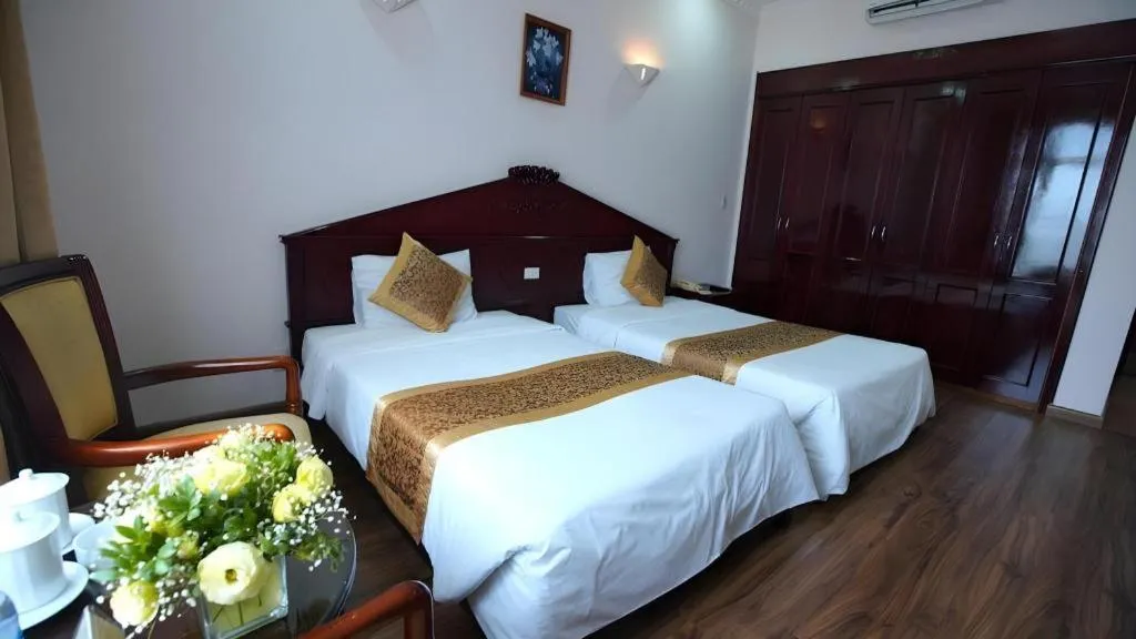 Bed in Cong Doan Viet Nam Hotel