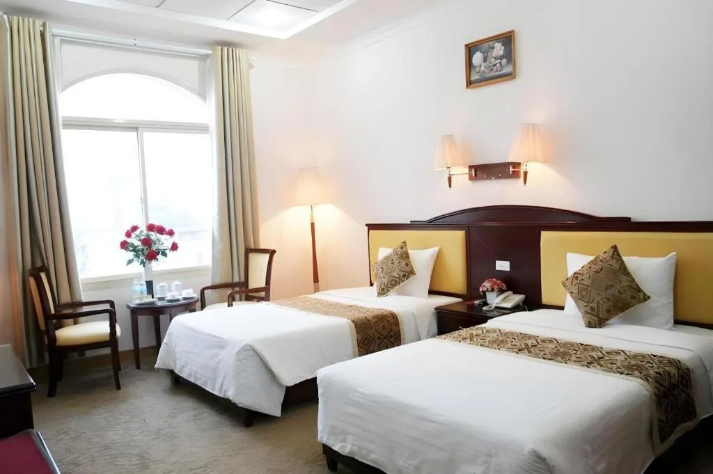 Bed in Cong Doan Viet Nam Hotel