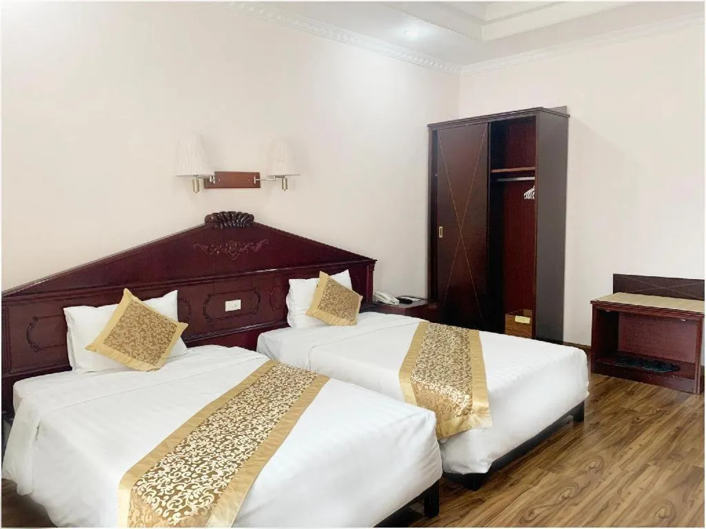 Bed in Cong Doan Viet Nam Hotel