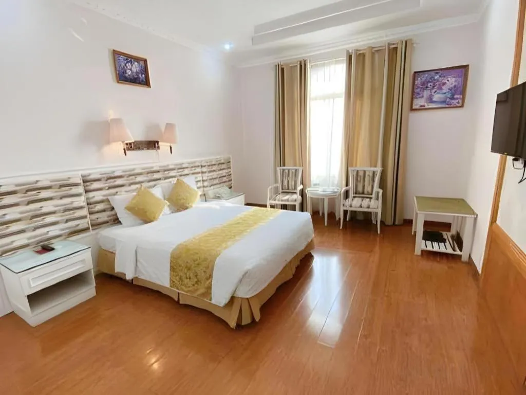 Bed in Cong Doan Viet Nam Hotel