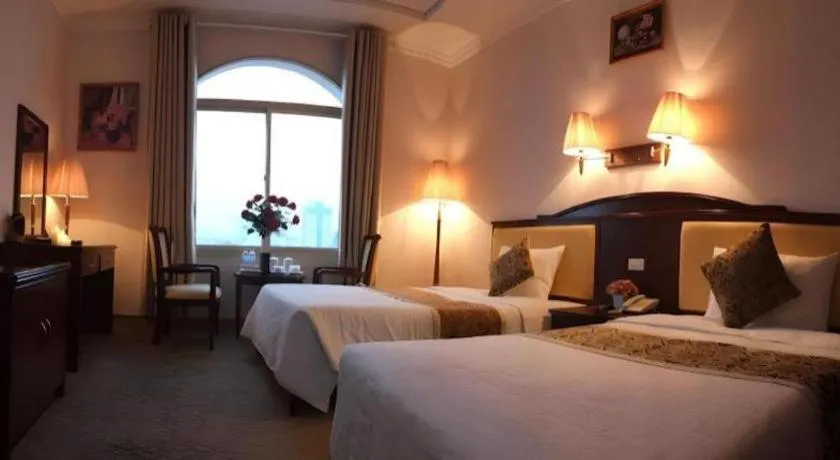 Bed in Cong Doan Viet Nam Hotel