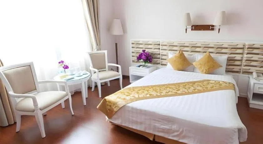 Bed in Cong Doan Viet Nam Hotel