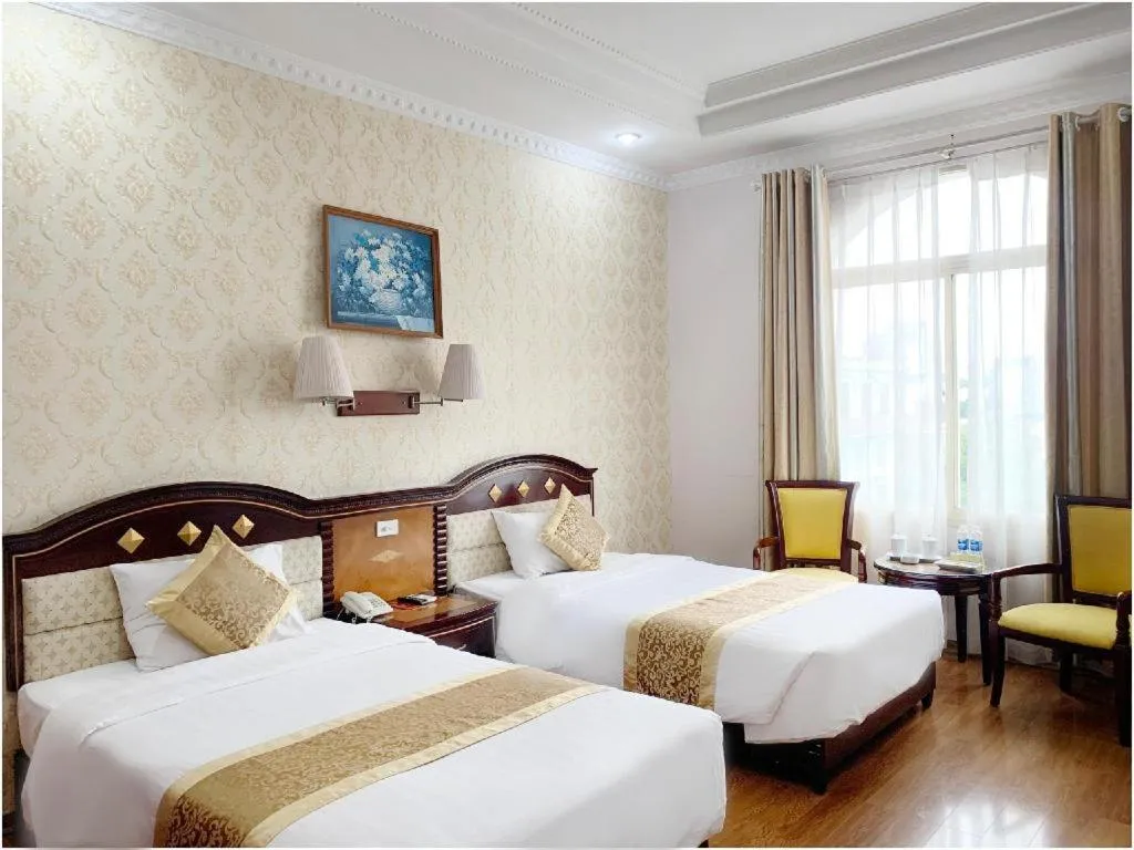 Bed in Cong Doan Viet Nam Hotel