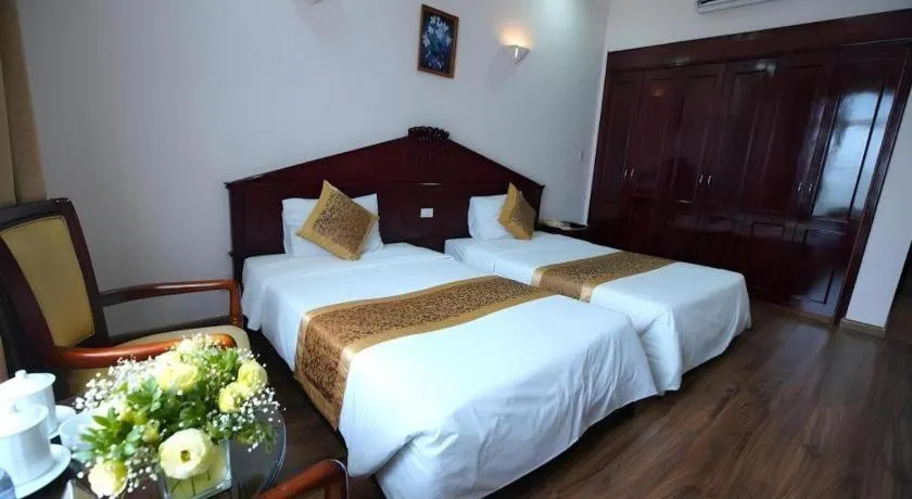 Bed in Cong Doan Viet Nam Hotel