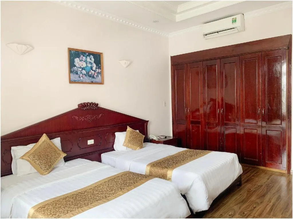 Bed in Cong Doan Viet Nam Hotel