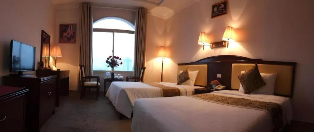 Bed in Cong Doan Viet Nam Hotel