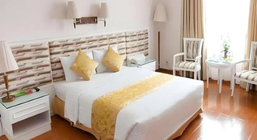Bed in Cong Doan Viet Nam Hotel