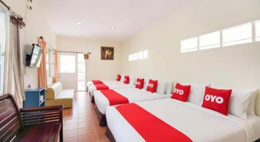 Bed in OYO 606 Baan Suansabai Pleanpanmai Resort Amphawa