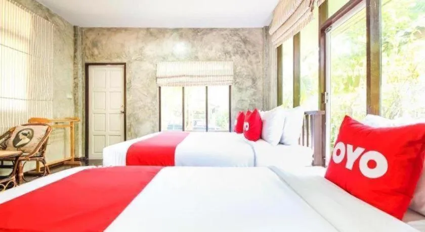 Bed in OYO 606 Baan Suansabai Pleanpanmai Resort Amphawa