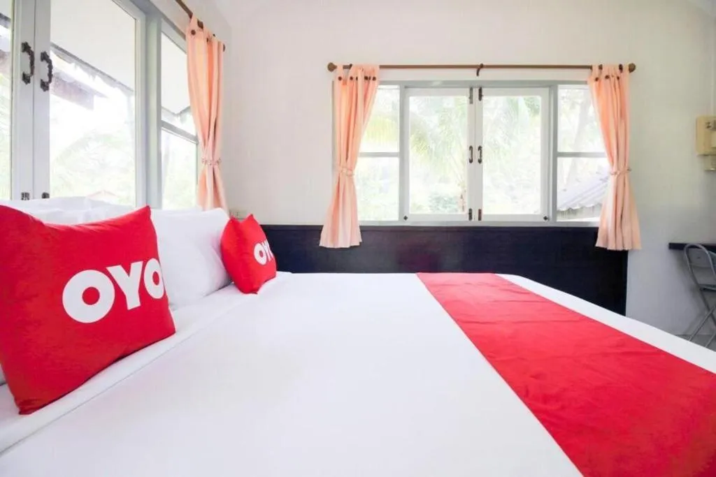 Bed in OYO 606 Baan Suansabai Pleanpanmai Resort Amphawa