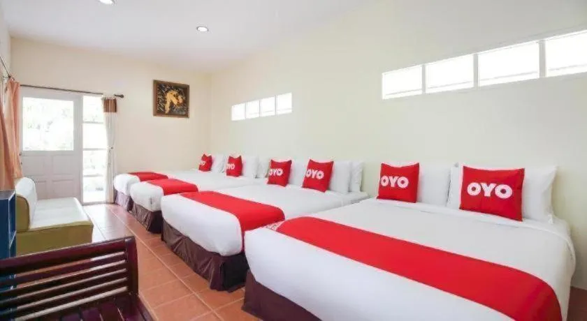 Bed in OYO 606 Baan Suansabai Pleanpanmai Resort Amphawa