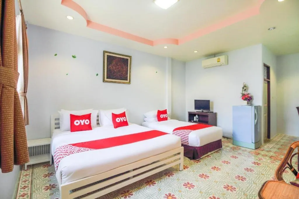 Bed in OYO 606 Baan Suansabai Pleanpanmai Resort Amphawa