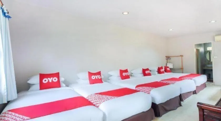 Bed in OYO 606 Baan Suansabai Pleanpanmai Resort Amphawa