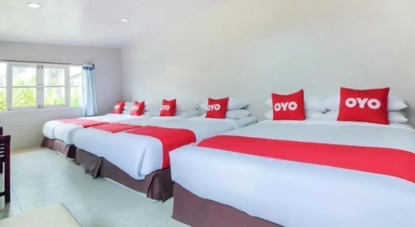Bed in OYO 606 Baan Suansabai Pleanpanmai Resort Amphawa