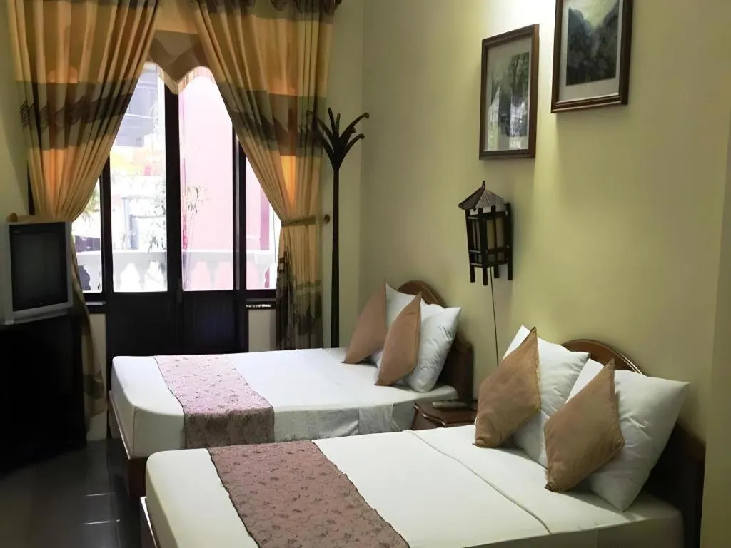 Bed in Dong Loi Hotel