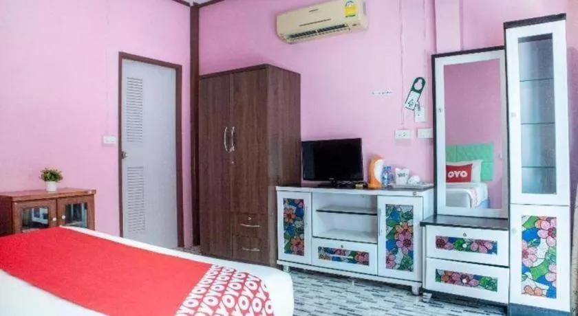 Bed in OYO 797 Pink House Bungalow