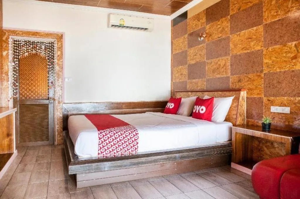 Bed in OYO 797 Pink House Bungalow