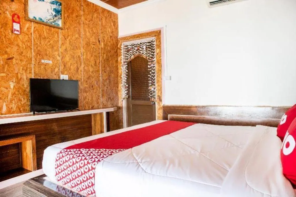 Bed in OYO 797 Pink House Bungalow