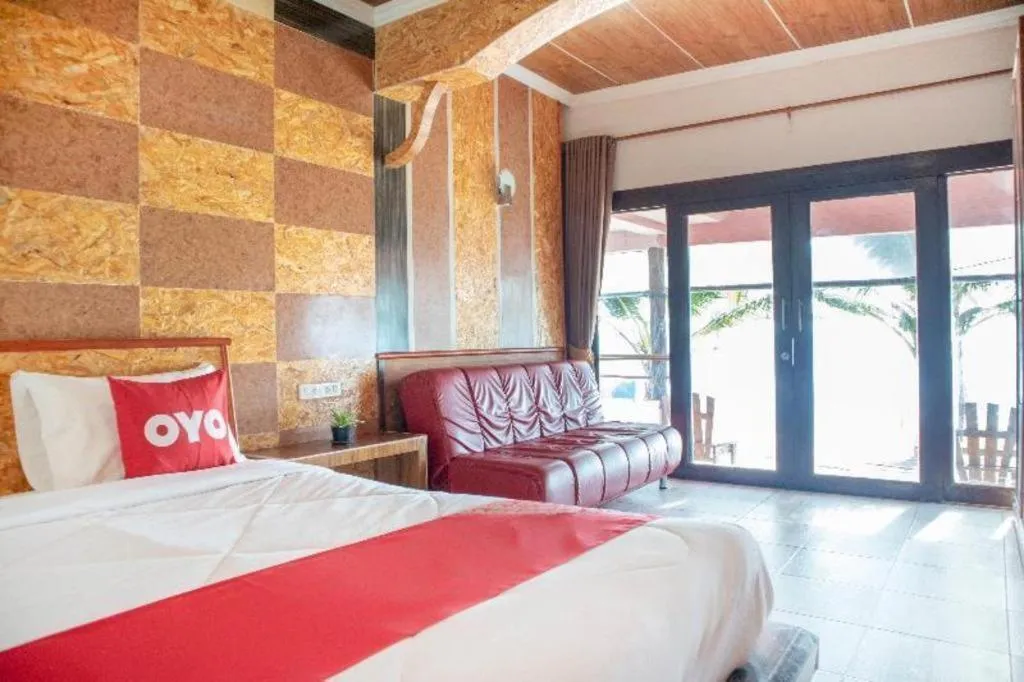 Bed in OYO 797 Pink House Bungalow