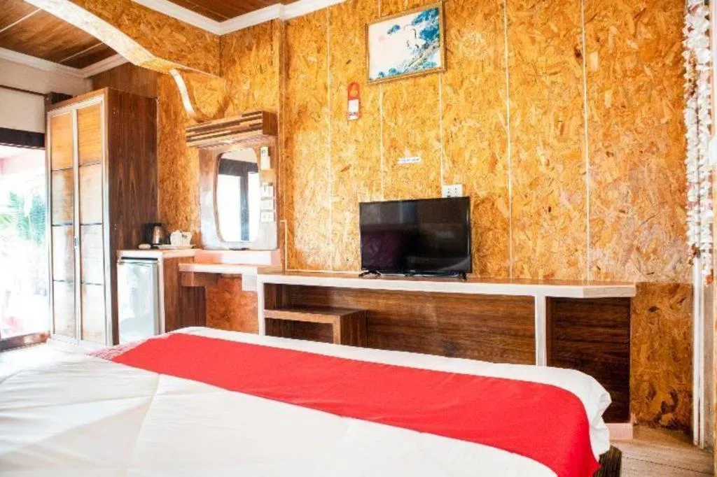 Bed in OYO 797 Pink House Bungalow