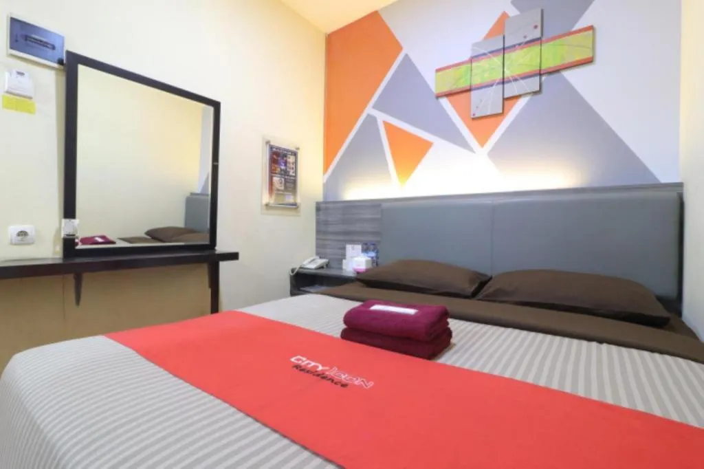 Bed in City Icon Residence