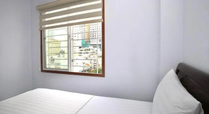 Bed in Nhatrang Cozy Hotel