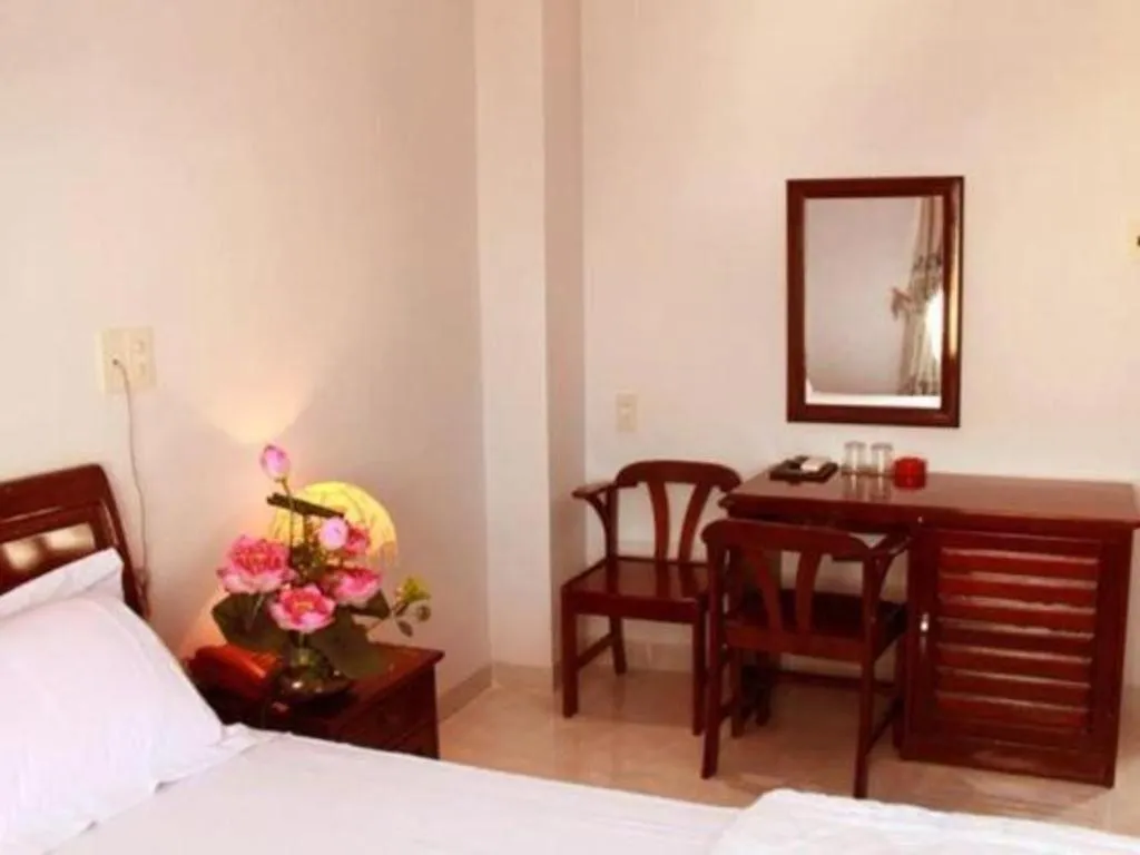 Bed in Nhatrang Cozy Hotel