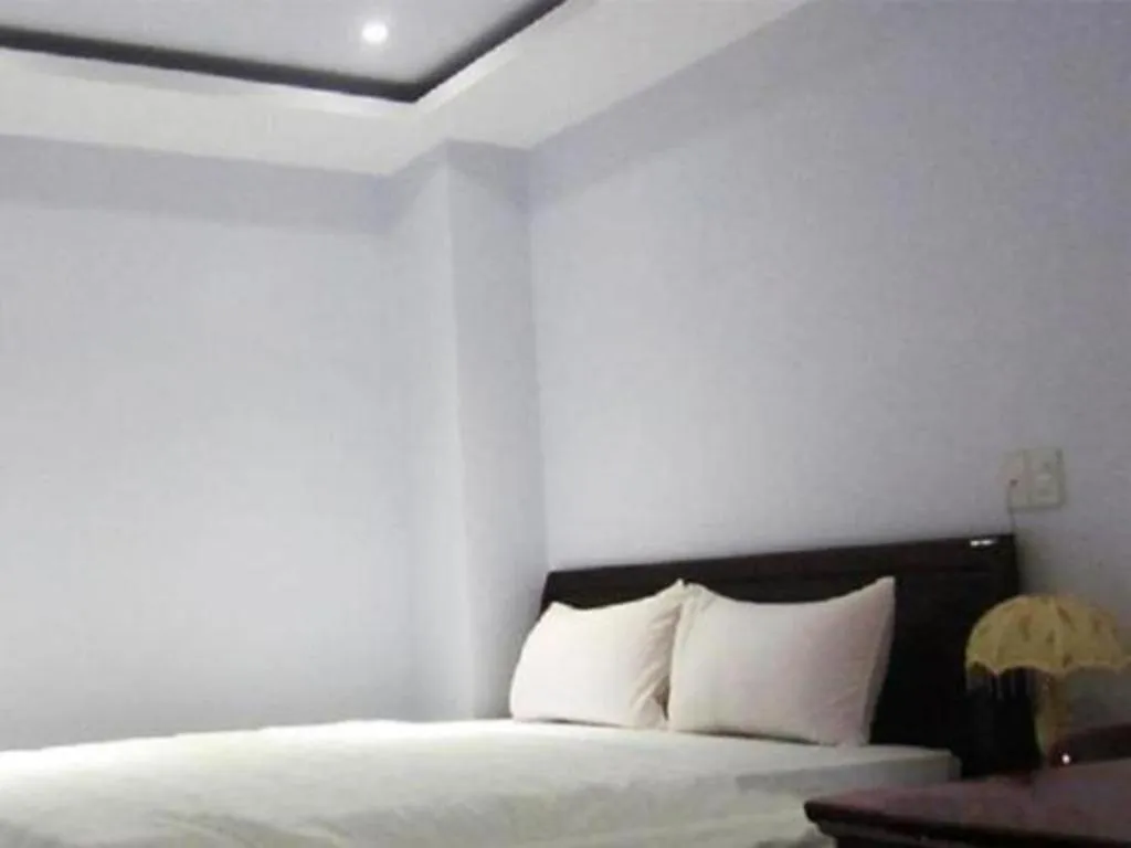 Bed in Nhatrang Cozy Hotel