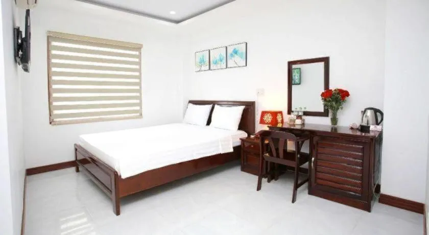 Bed in Nhatrang Cozy Hotel